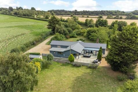 Rear view of Rectory Hill Cottage with terrace and