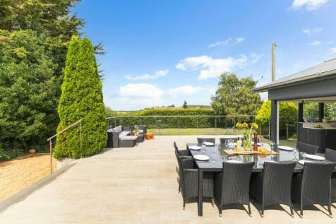 Terrace dining with views across the countryside