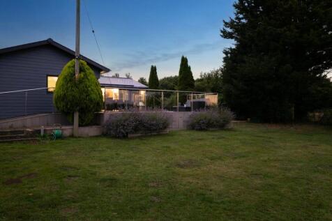 Rear garden at dusk - alternative view