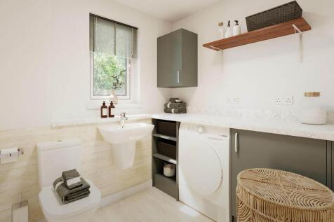 A utility area has plenty of space laundry appliances