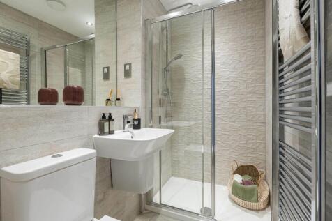 Bedroom 1 also features a private en suite shower room