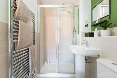 Bedroom 1 also features a private en suite shower room