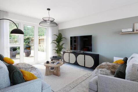 Double doors to the garden create a bright and inviting lounge
