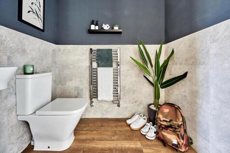 A guest cloakroom completes the ground floor