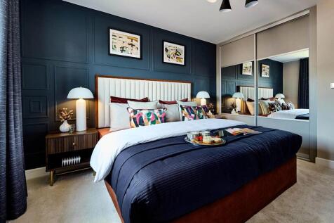 The main bedroom offers a place to unwind away from the rest of the home and also features a privat