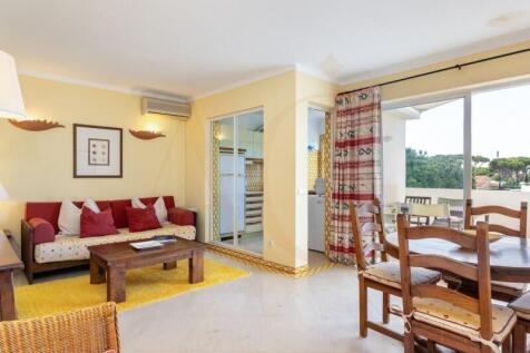 Living and dining room with balcony