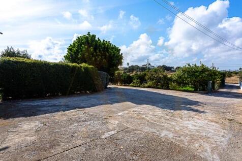 House with fenced land