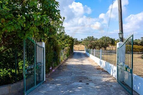 House with fenced land