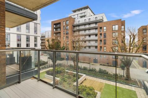 Experience urban tranquility with this stunning balcony view in the heart of the city.