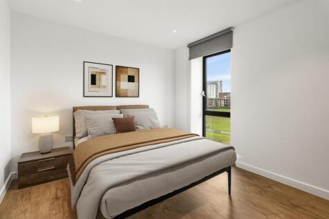 Experience tranquility in this beautifully designed bedroom with a stunning view.