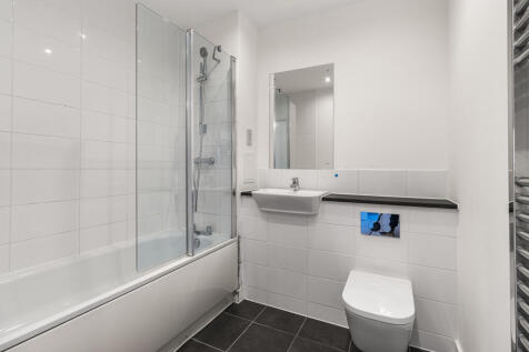 Experience luxury in this sleek and modern bathroom.