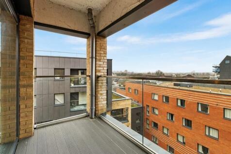 Experience serene urban living from this stylish balcony.