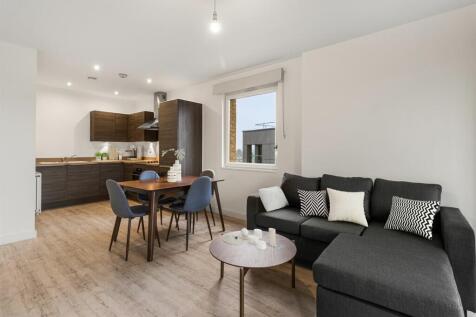 Experience seamless living with this stylish open-concept design, perfect for relaxation and entertaining.