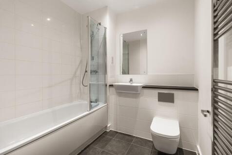 Step into luxury with this beautifully designed modern bathroom, offering style and comfort.