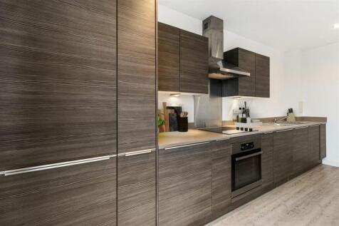 Elevate your culinary experience with this sleek and modern kitchen design.