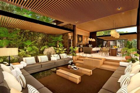 The image showcases a spacious, open-air living ro