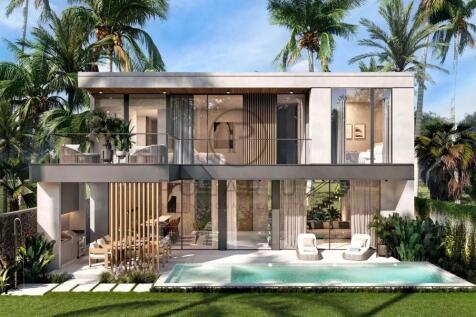 Modern two-story villa with large glass windows, s