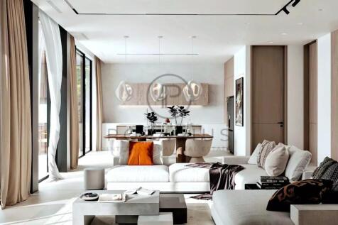 A modern, spacious living and dining area with neu