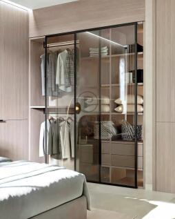The image shows a modern bedroom with an open ward