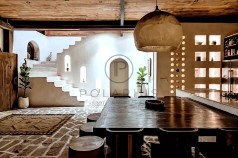 A cozy, rustic indoor space featuring a wooden din