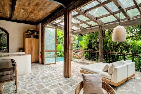 A modern indoor space with natural wood accents an