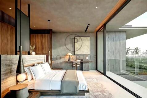A modern bedroom with a large bed, wooden accents,