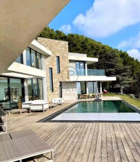 A modern house with a sleek design features large