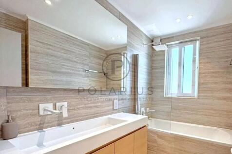 Modern bathroom with a spacious double sink, large