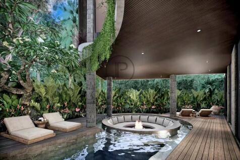 A luxurious outdoor lounge area features a pool wi
