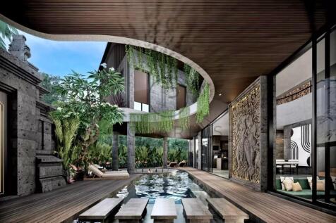 Modern open-concept villa with a central pool, woo