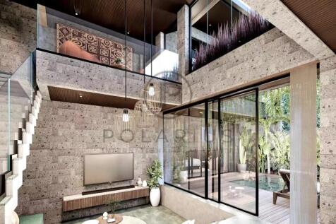 A modern, airy living room in Ubud, Bali, with hig