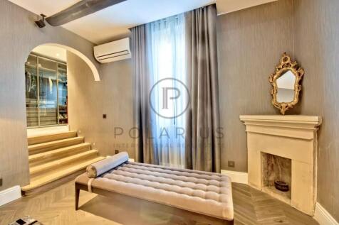 Stylish room with a modern chaise lounge, ornate m