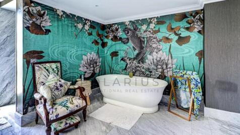 A luxurious bathroom features a freestanding batht