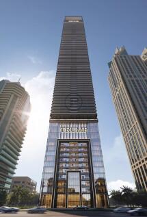 A tall, modern skyscraper with reflective glass an