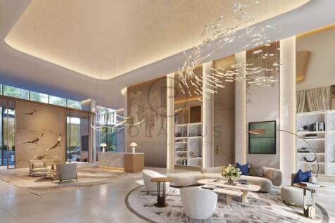 A spacious, elegant living room features modern fu