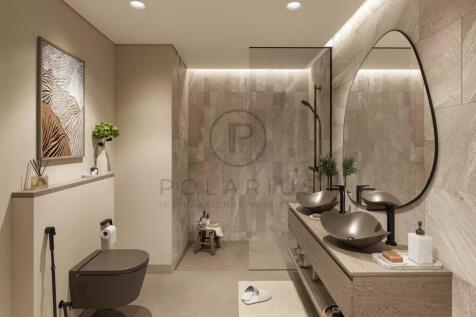 This image shows a modern bathroom with neutral-to