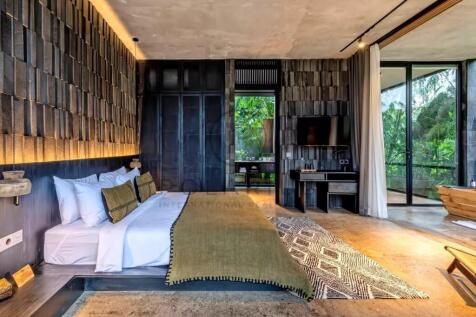 This image shows a modern bedroom with a minimalis