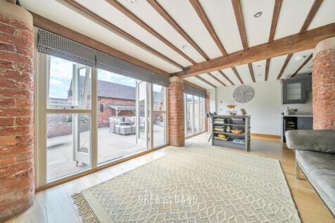 Open-plan living space and south-facing courtyard