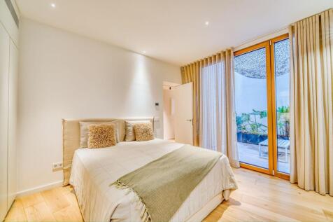 Schlafzimmer mit Patio