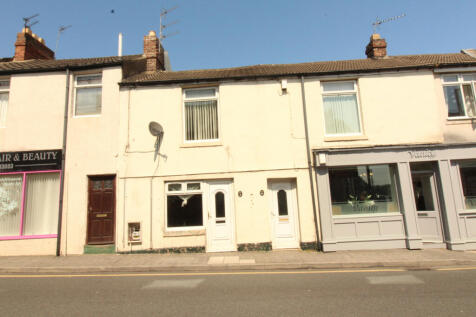 4 Apartments, 1 Commercial Unit &amp; 2 Garages |