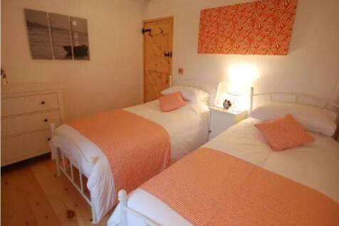 With vaulted ceilings in both bedrooms.JPG