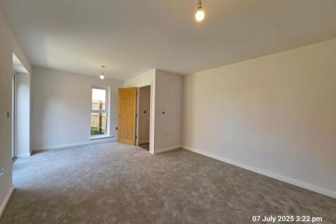 Lounge area leading to rear garden