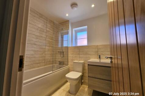 Family bathroom with screened shower