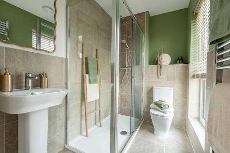 Two bedrooms boast their own en-suite shower rooms