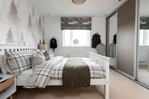 The second bedroom also boasts an en-suite shower room