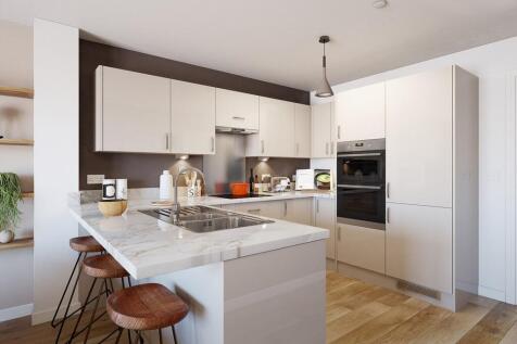 The kitchen features a handy breakfast bar