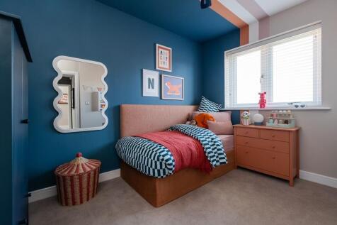 This bedroom is well-suited to a child
