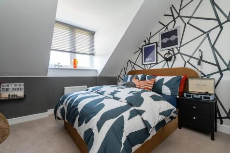 A top floor double bedroom perfect for guests or older children