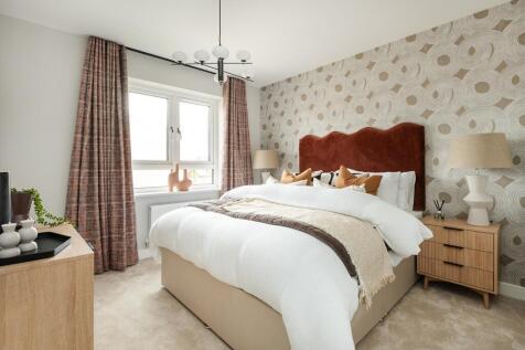 Relax after a long day in the main bedroom