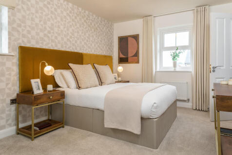 En suite main bedroom in the Alderney 4 bedroom home